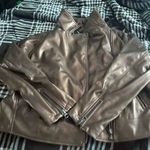 Metallic gold faux leather jacket from torrid.  It’s a size two from Torrid.